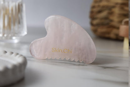 Skin Chi Rose Quartz Comb Edge Gua Sha - stone detail close-up